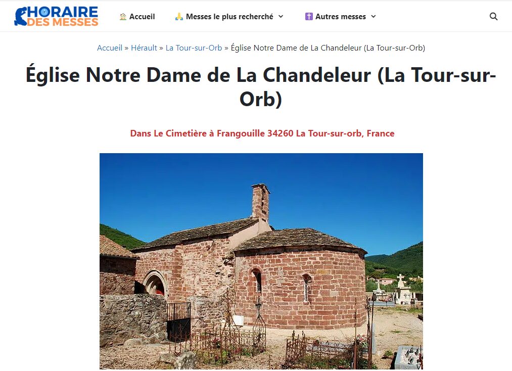 Capture d'écran d'un site internet avec la photo de l'église Ste Marie de Frangouille (prise depuis le cimetière) . Ciel bleu, vue sur quelques tombes, construction de l'église en pierre de gré rouge